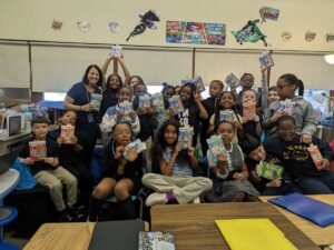 3rd, 4th, 5th grade students posing after a virtual visit with Lowey Bundy Sichol.